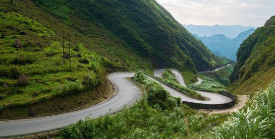 ha-giang-loop-tours-mountain-road-adventure Ha Giang Loop Tours - winding mountain road perfect for adventure and photography travel in Northern Vietnam.