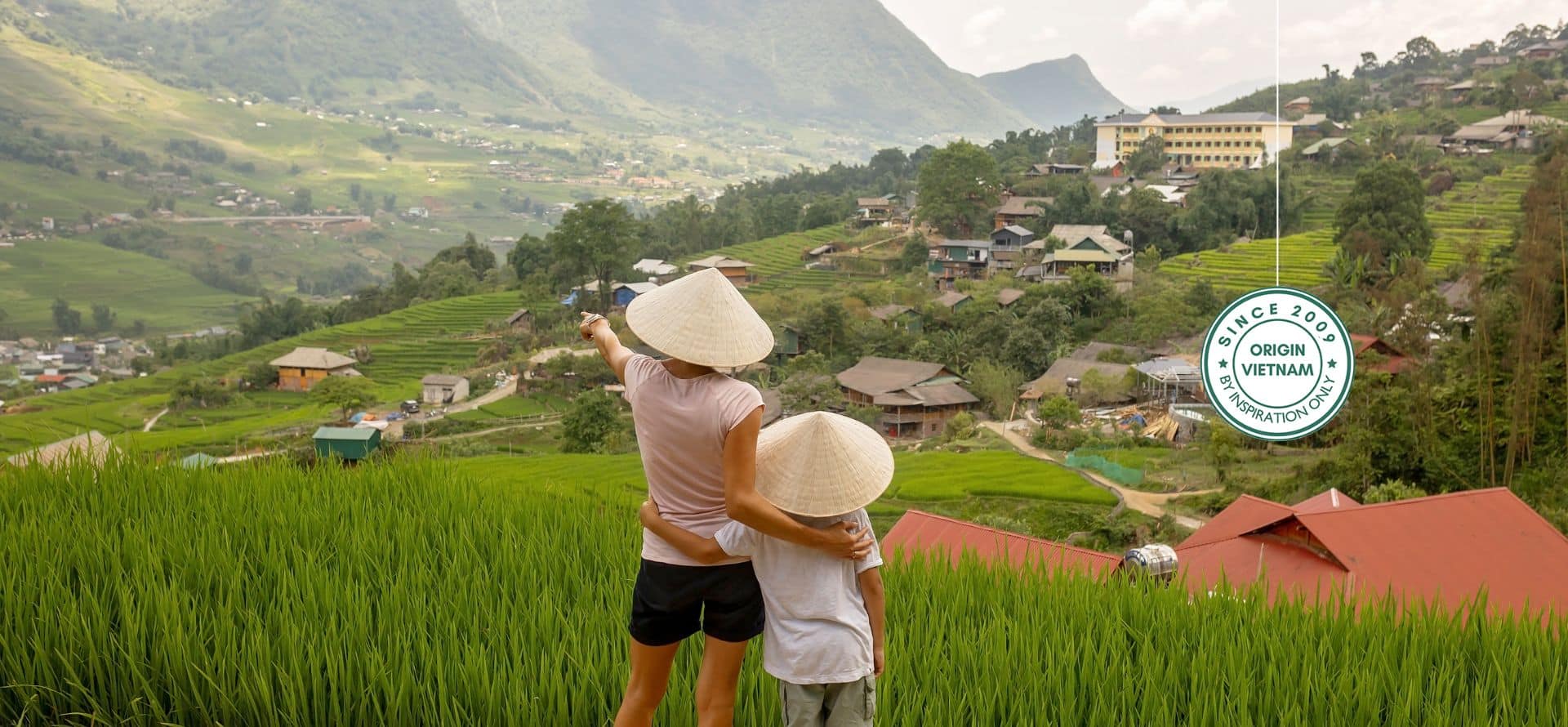 Family enjoying terraced fields and mountain scenery in Sapa
