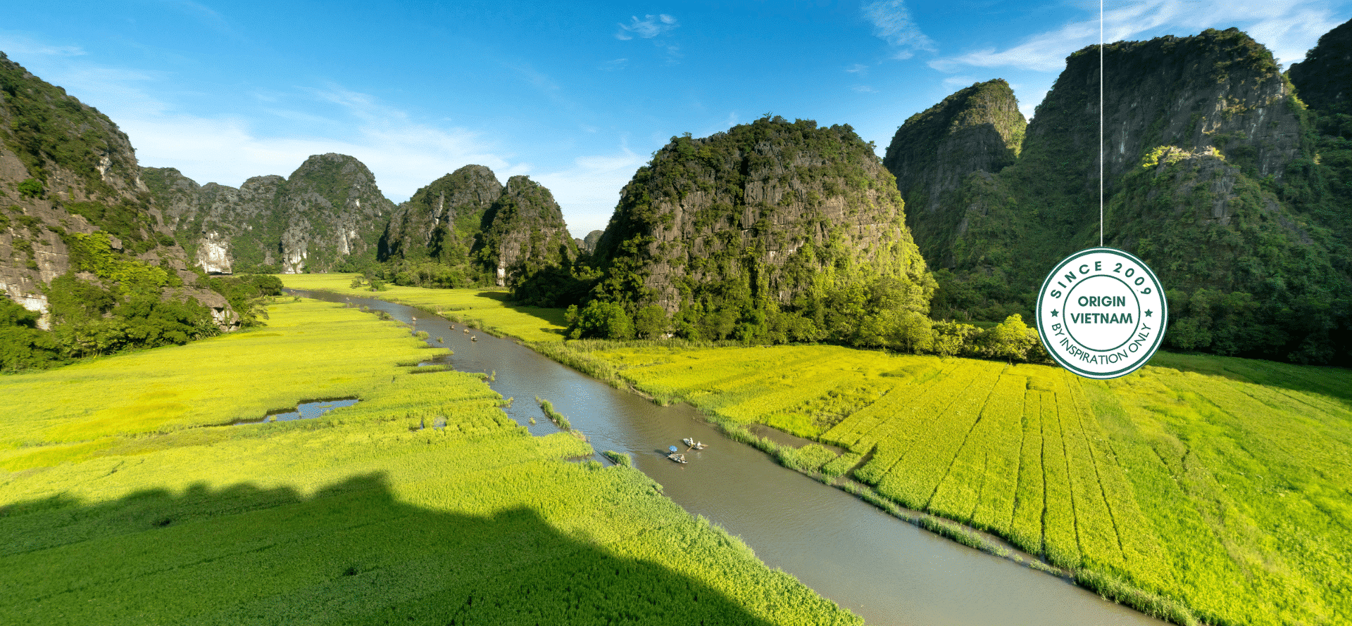 Tam Coc boat tours through rice fields and limestone caves